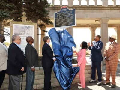 Dignitaries and civil rights veterans unveil a new historical marker on the Atlantic City Boardwalk.