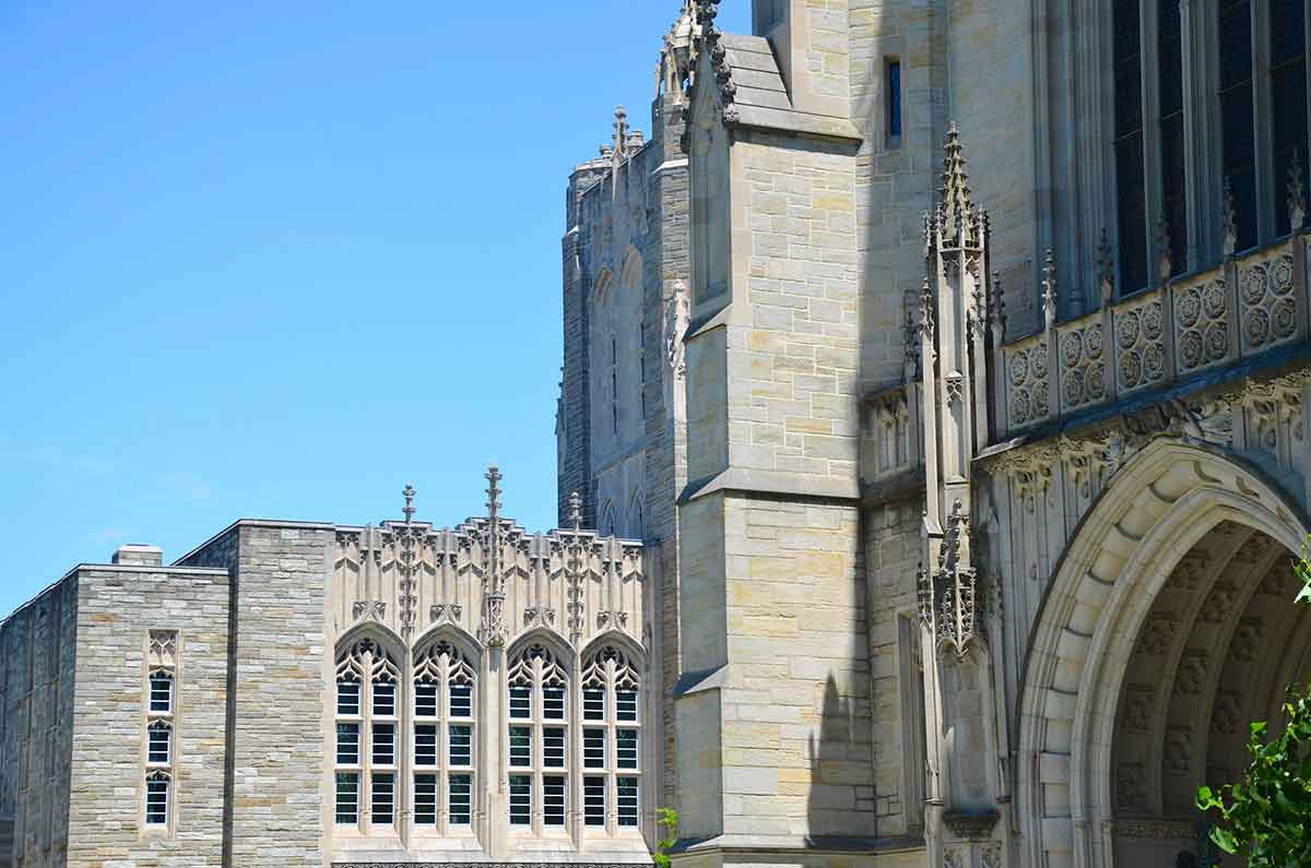 Exterior of Princeton's Firestone Library, photographed with the Chapel in the foreground