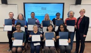 Graduates of JLab cohort 3 display their certificates