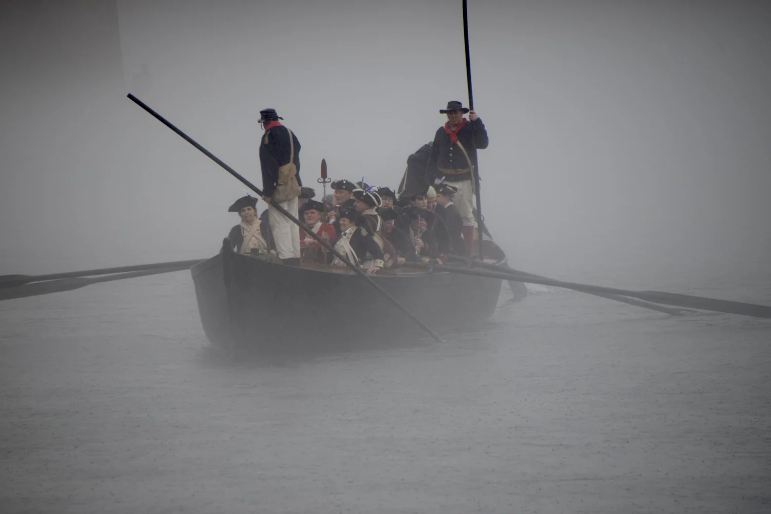 Reenactment of Washington Crossing the Delaware - Reenactors in a foggy boat