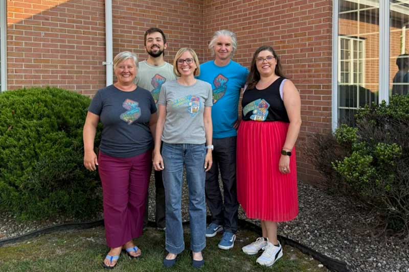 NJCH staff wearing NJCH-branded shirts